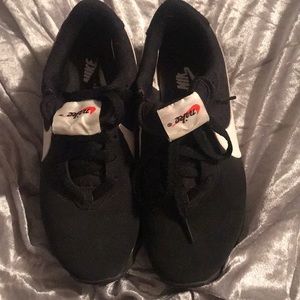 Black swoosh nikes